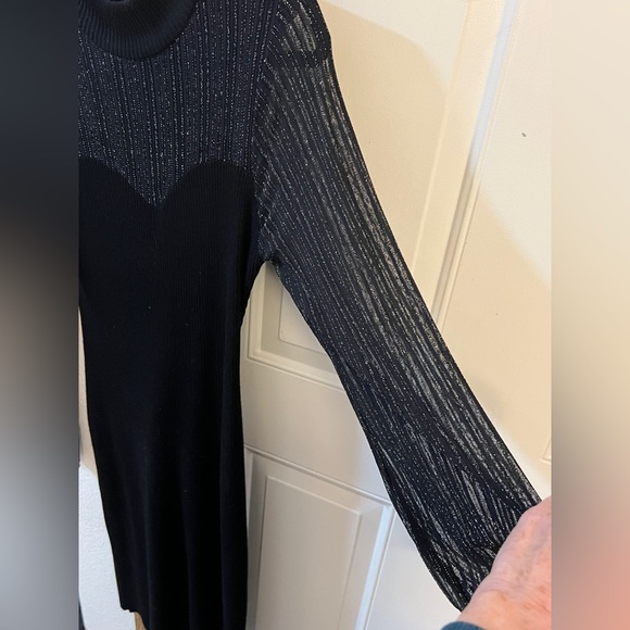 Worn once. Very flattering black stretchy dress with Sheer chest area. - Picture 5 of 9